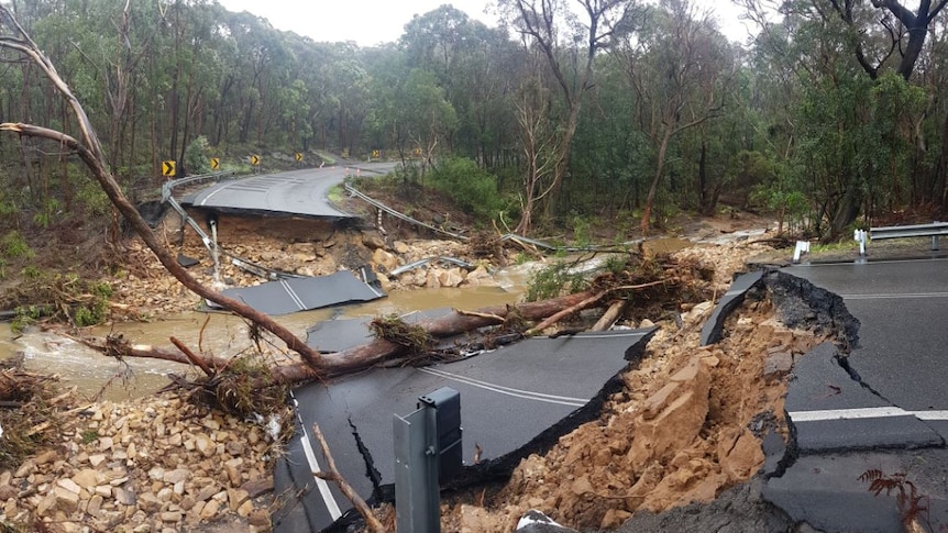 Road broken away over floodwaters