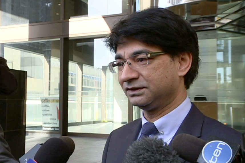 Lloyd Rayney speaking to reporters.