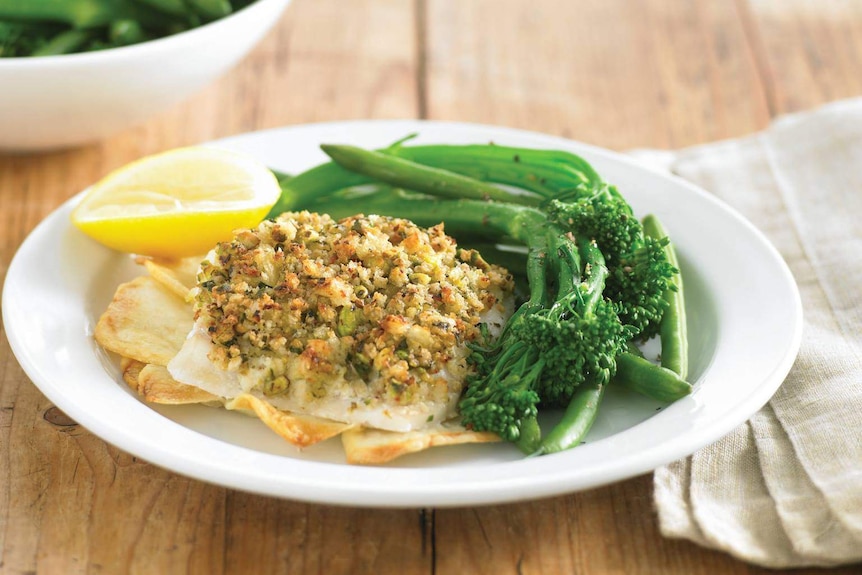 Dinner plate with fish and vegetables