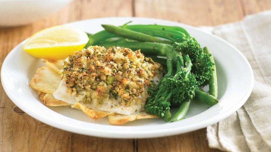 Dinner plate with fish and vegetables