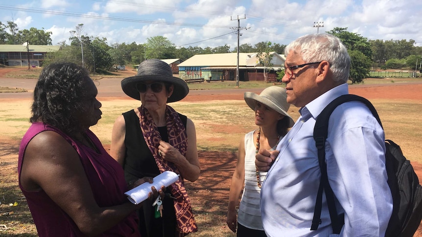 Djapirri Mununggirritj standing and speaking with the commissioners