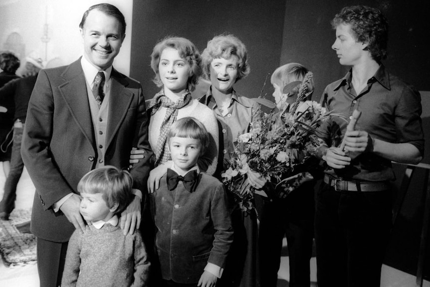 Black and white photo of teenage Ursula von der Leyen alongside her family on a German TV set after performing in their band.