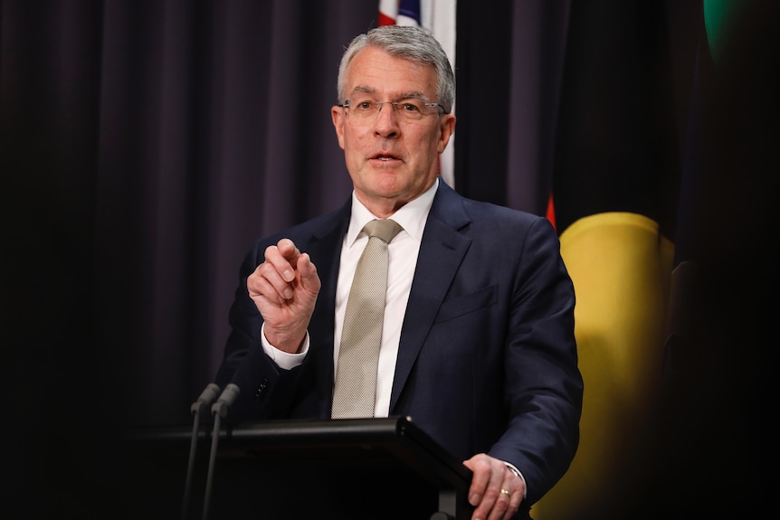 Mark Dreyfus speaks at a lecturn at a press conference