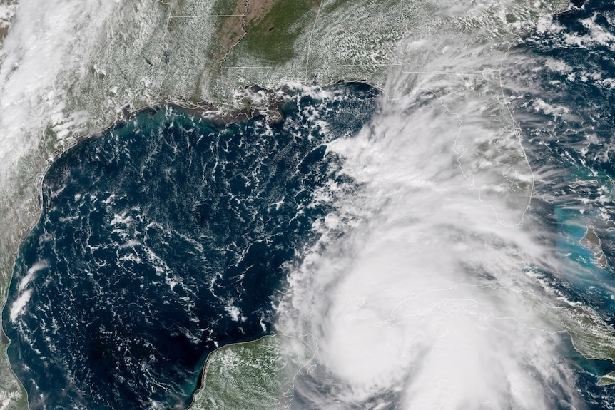 A satellite image of Hurricane Michael, which is heading towards the US state of Florida. Parts of the storm obscure Florida.