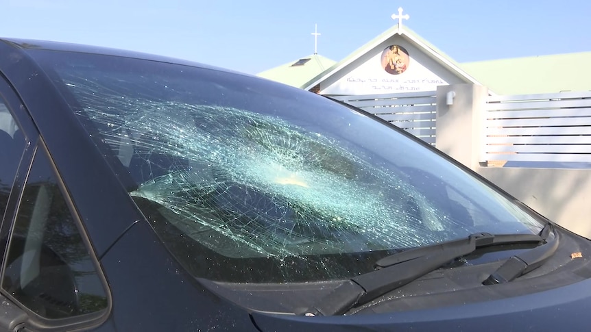 Smashed car outside Wakeley church after a riot following alleged stabbing of a bishop