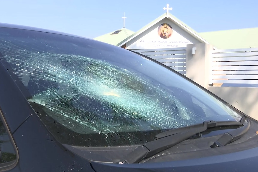 Smashed car outside Wakeley church after a riot following alleged stabbing of a bishop