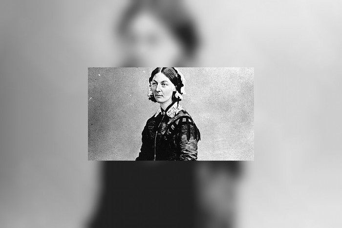 A black-and-white photo of an austerely dressed, dark-haired woman — Florence Nightingale.