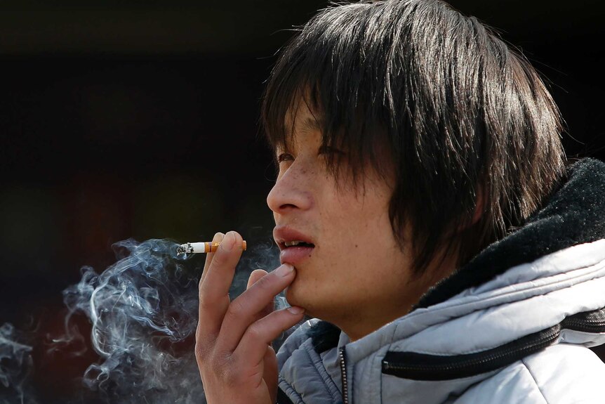 Man smokes in China