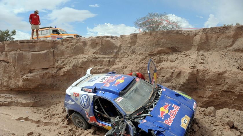 The Volkswagen belonging to two-time rally world champion Carlos Sainz sits where it crashed
