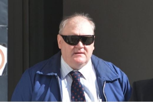 John Joseph Farrell walks out of court