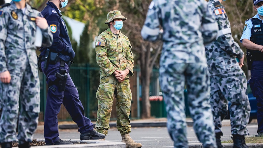masked australian solders hanging in the street