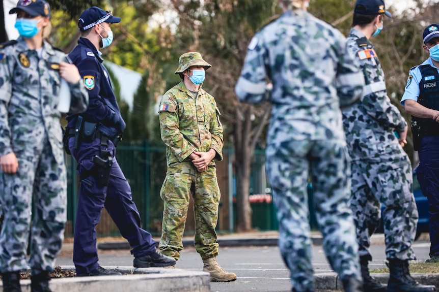 masked australian solders hanging in the street