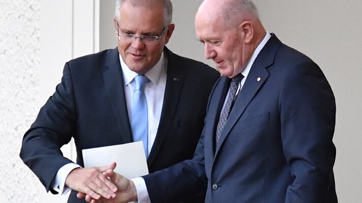 Prime Minister Scott Morrison shakes hands with Governor General Peter Cosgrove.