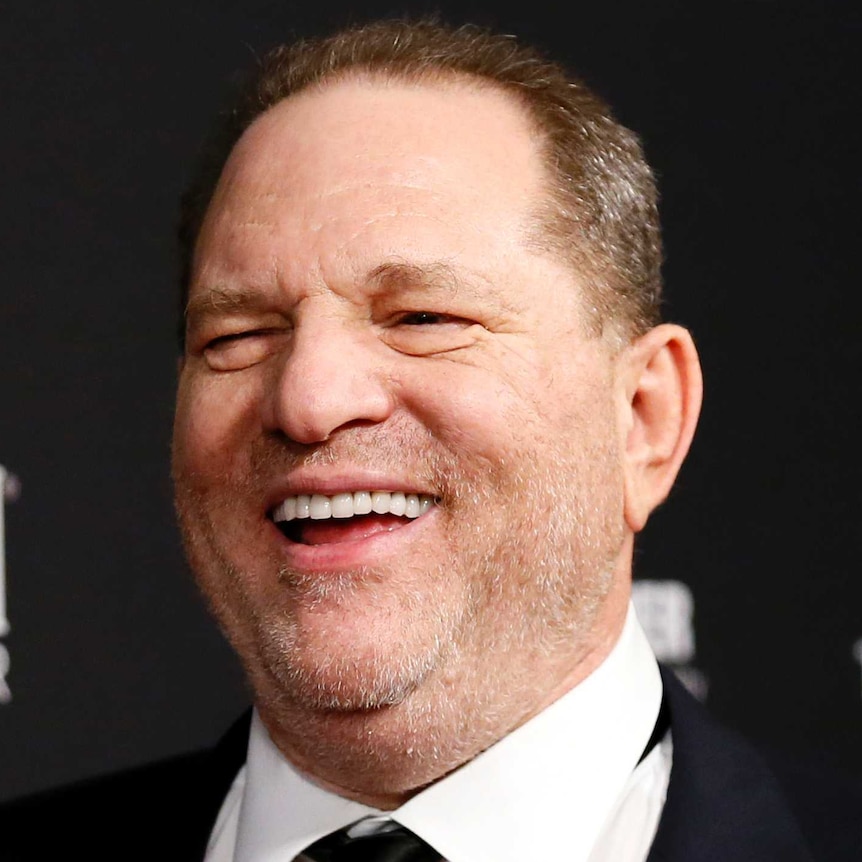 Weinstein laughs on the red carpet of the Golden Globes after party in 2014.