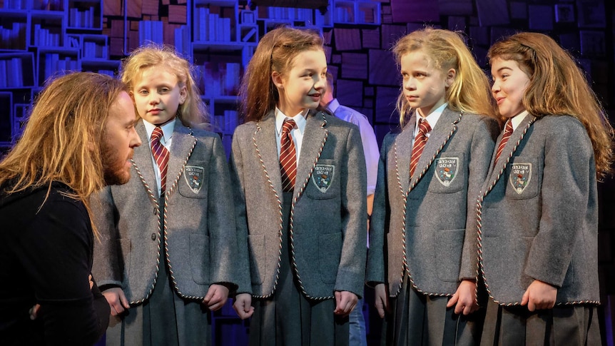 Composer and lyricist of Matilda the Musical Tim Minchin with the cast
