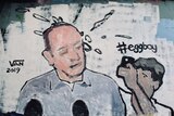 A painted mural depicts the moment an egg was cracked over the head of Senator Fraser Anning.