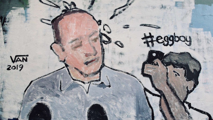 A painted mural depicts the moment an egg was cracked over the head of Senator Fraser Anning.