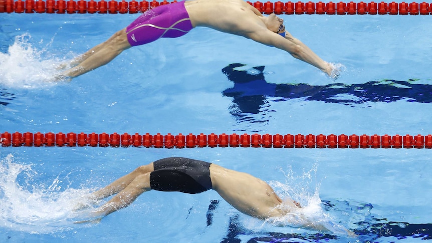 Camille Lacourt, Mitchell Larkin compete in men's 100m Backstroke heats