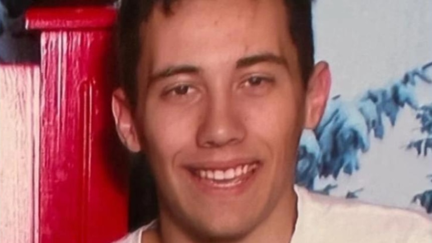 A missing man notice and headshot of man smiling 