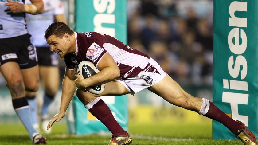 Triple threat: Anthony Watmough dives over for one of his three first-half tries.