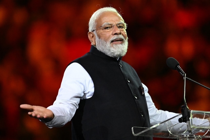 India’s Prime Minister Narendra Modi speaks in a stadium in Sydney
