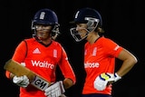 Edwards and Taylor talk during the first T20 of the Women's Ashes