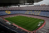 Barcelona plays in front of an empty Nou Camp