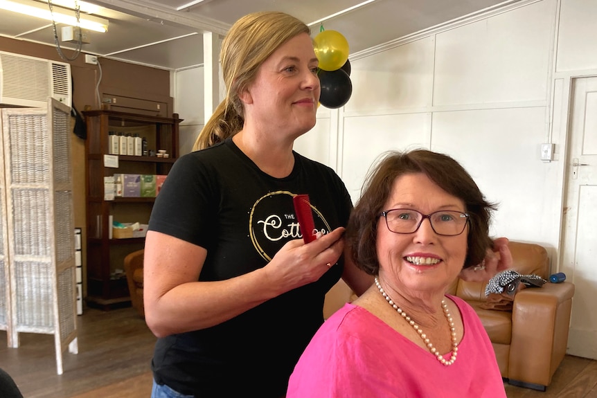 Moura's hairdresser Jackie Campbell with her client Judy Nobbs