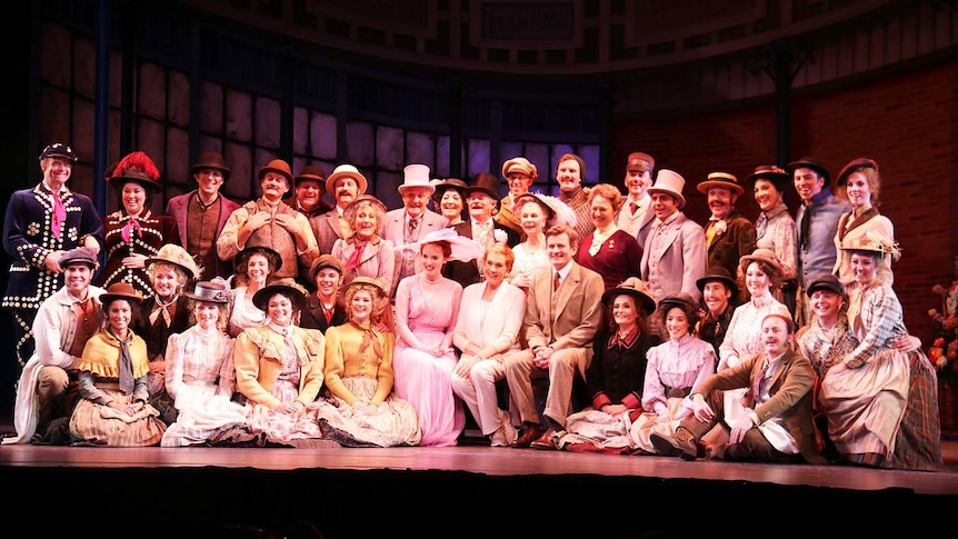 The cast of the musical My Fair Lady, with director Dame Julie Andrews (centre)