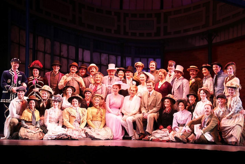 The cast of the musical My Fair Lady, with director Dame Julie Andrews (centre)