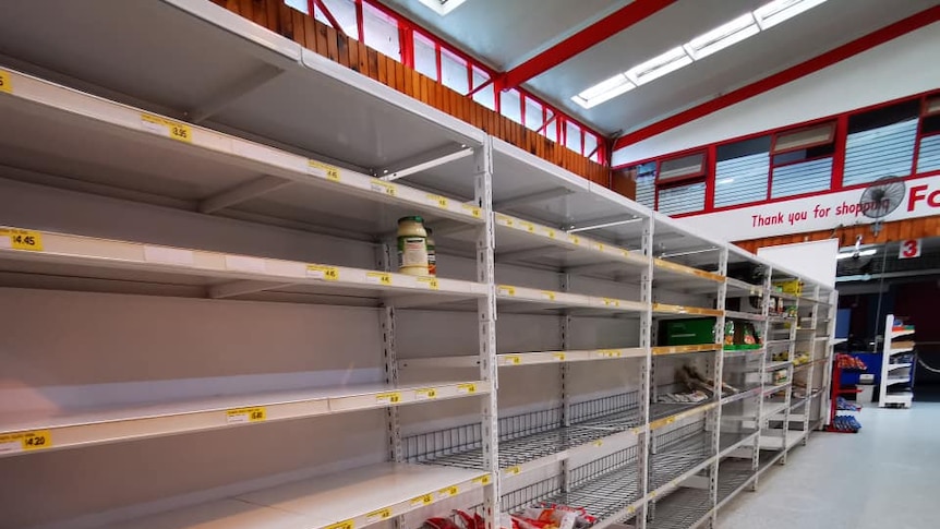 A supermarket in Norfolk Island with almost completely empty shelves