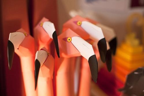 Paper flamingos by designer Benja Harney