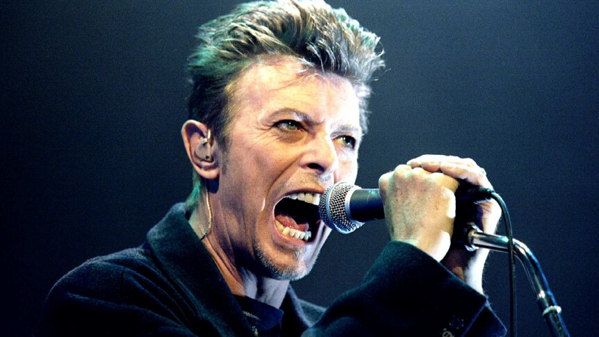 David Bowie screams into the microphone