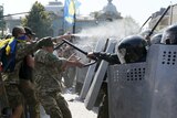 Demonstrators clash with police outside parliament in Kiev, Ukraine
