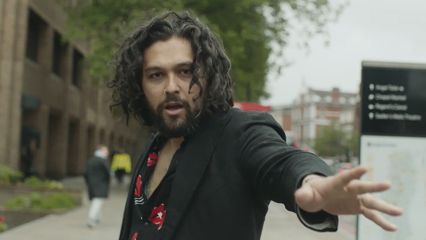 Gang of Youths frontman Dave Le'aupepe in the 2021 music video for 'The Angel of 8th Ave'