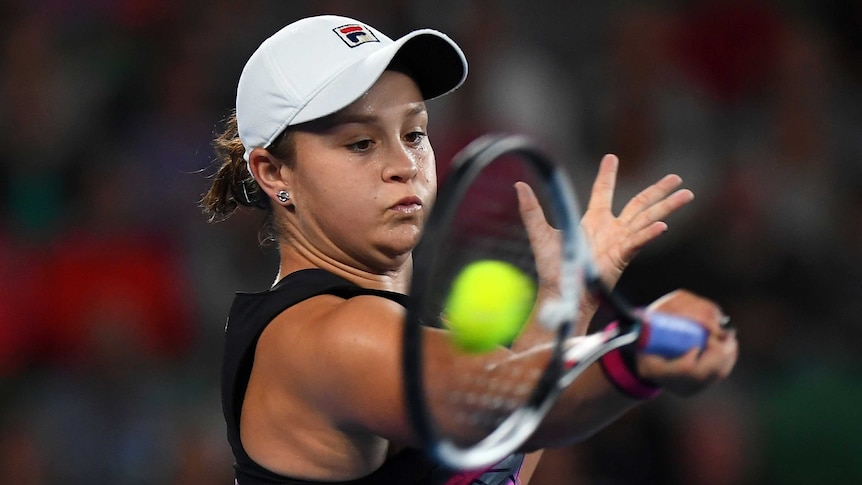 Australia's Ashleigh Barty hits a forehand against Germany's Mona Barthel at the Australian Open.