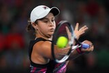 Australia's Ashleigh Barty hits a forehand against Germany's Mona Barthel at the Australian Open.