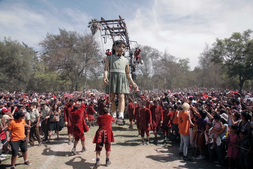 The little girl giant is six metres tall.