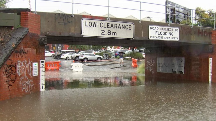 A railway underpass at South Melbourne submerged in floodwaters.