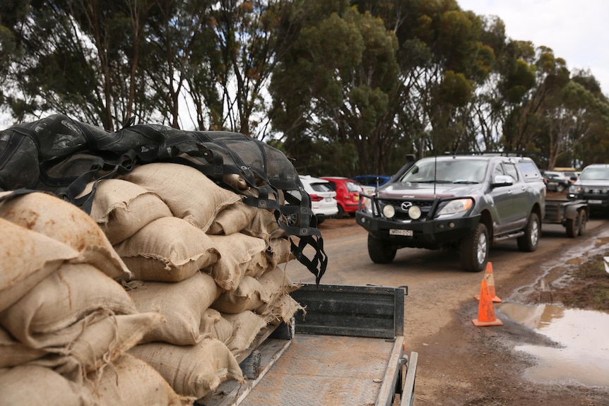 A ute tray full of sand bags