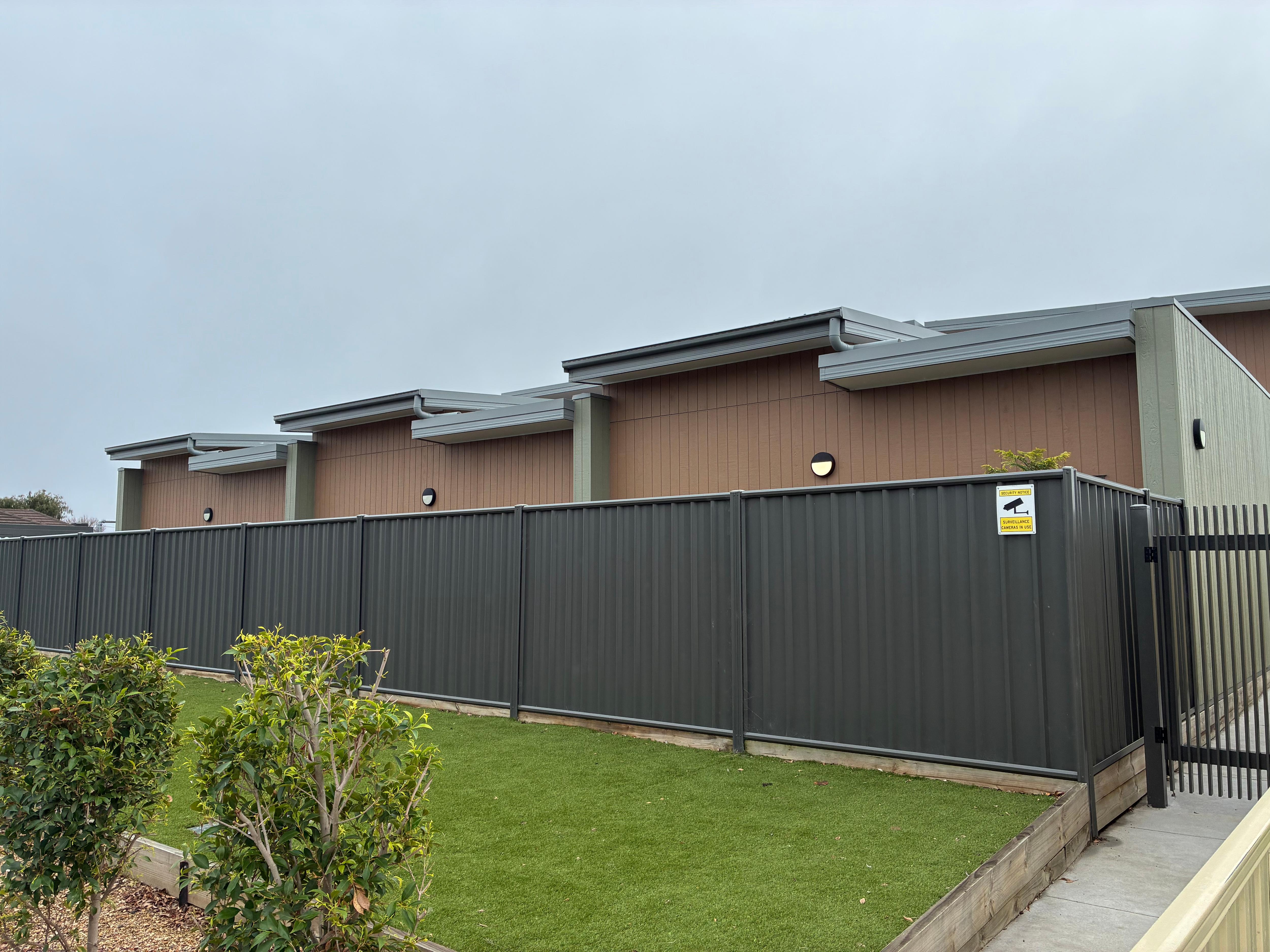 A fence in front of a building
