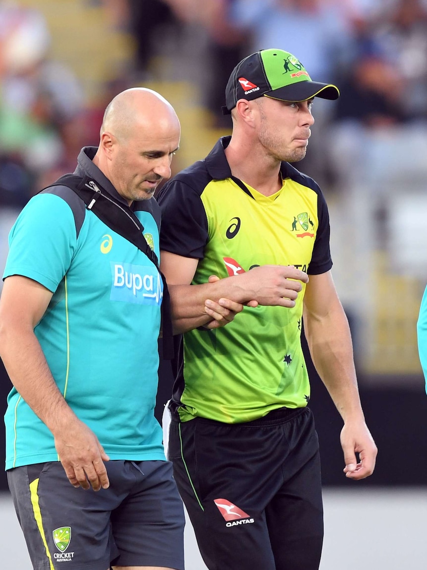 Chris Lynn goes off injured against New Zealand in a T20I at Eden Park in February 2018.
