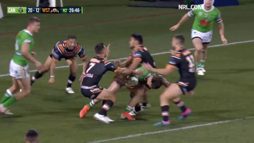 A screengrab of a broadcast of a rugby league player escaping the in-goal area