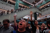 Hundreds of protestors gathered at a mall in Hong Kong and sang their anthem.