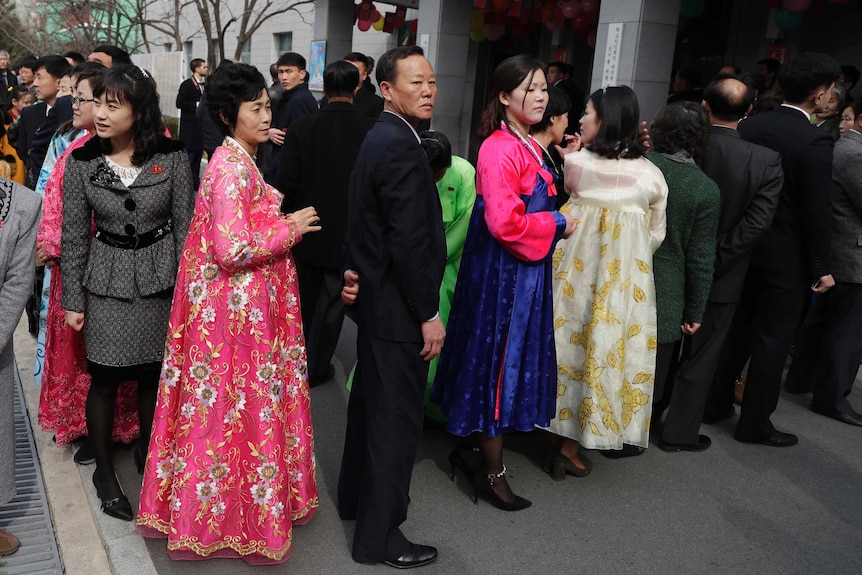 North Koreans line up to vote during the election at a polling station in Pyongyang.