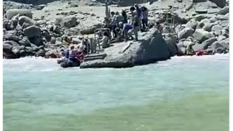 Passengers on the boat the Phoenix filmed survivors being rescued from White Island.