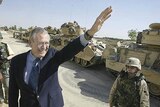 Rumsfeld waves to US troops