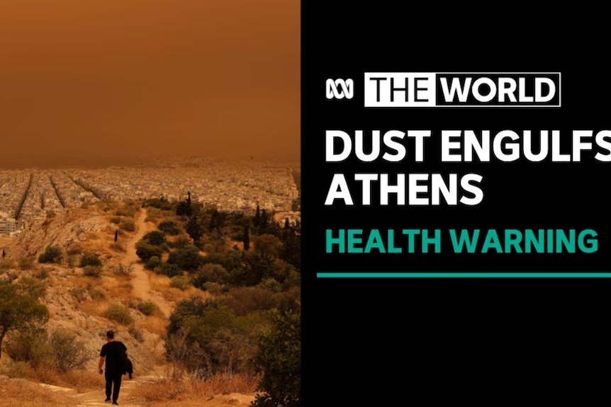 Dust Engulfs Athens, Health Warnings: A man walks down a hill in the foreground as a city is blanketed in orange dust.