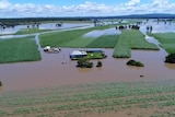 An aerial shot of a flooded farm