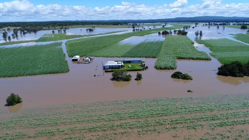 An aerial shot of a flooded farm